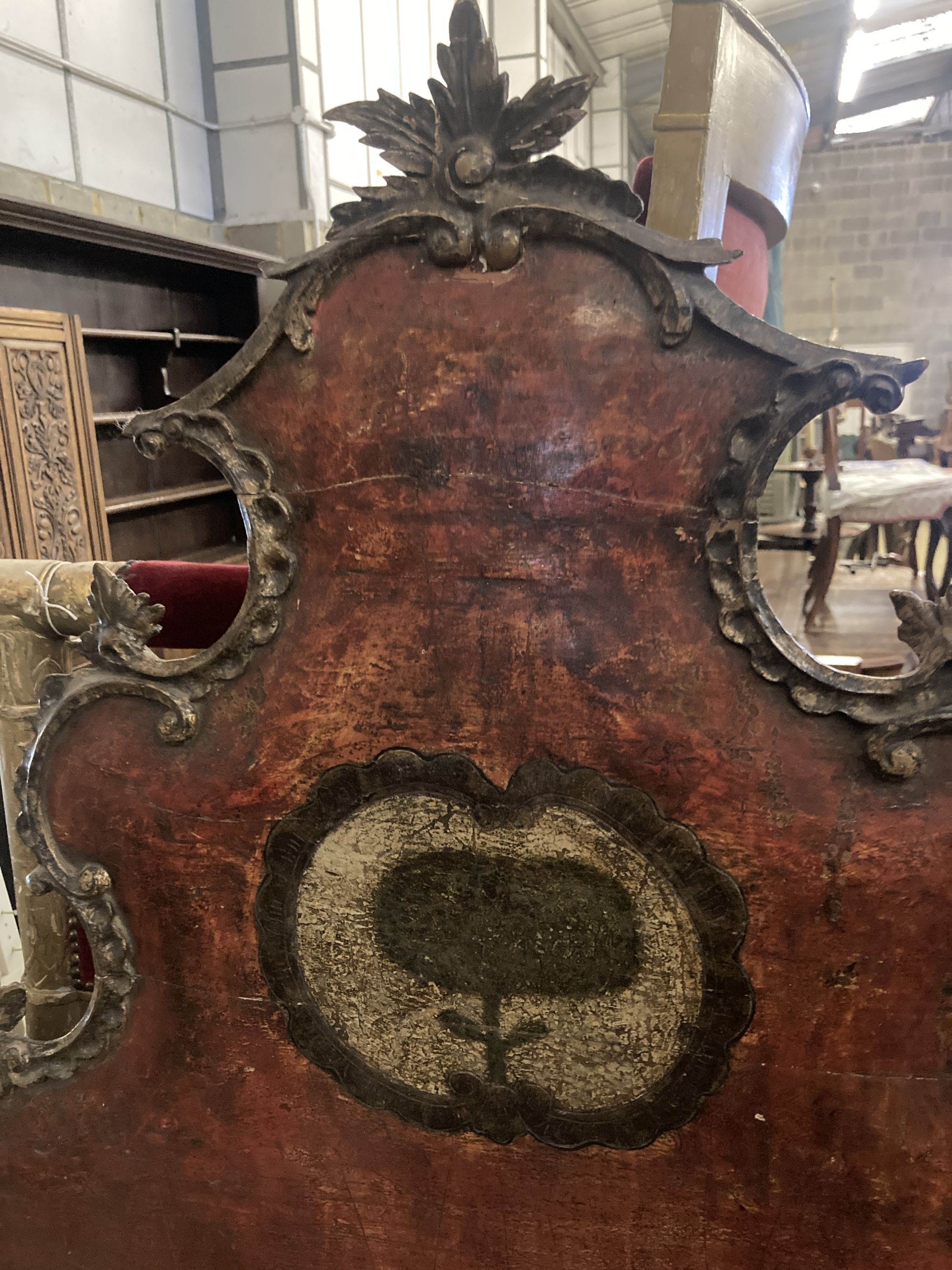 An 18th century painted headboard, width 124cm, height 170cm